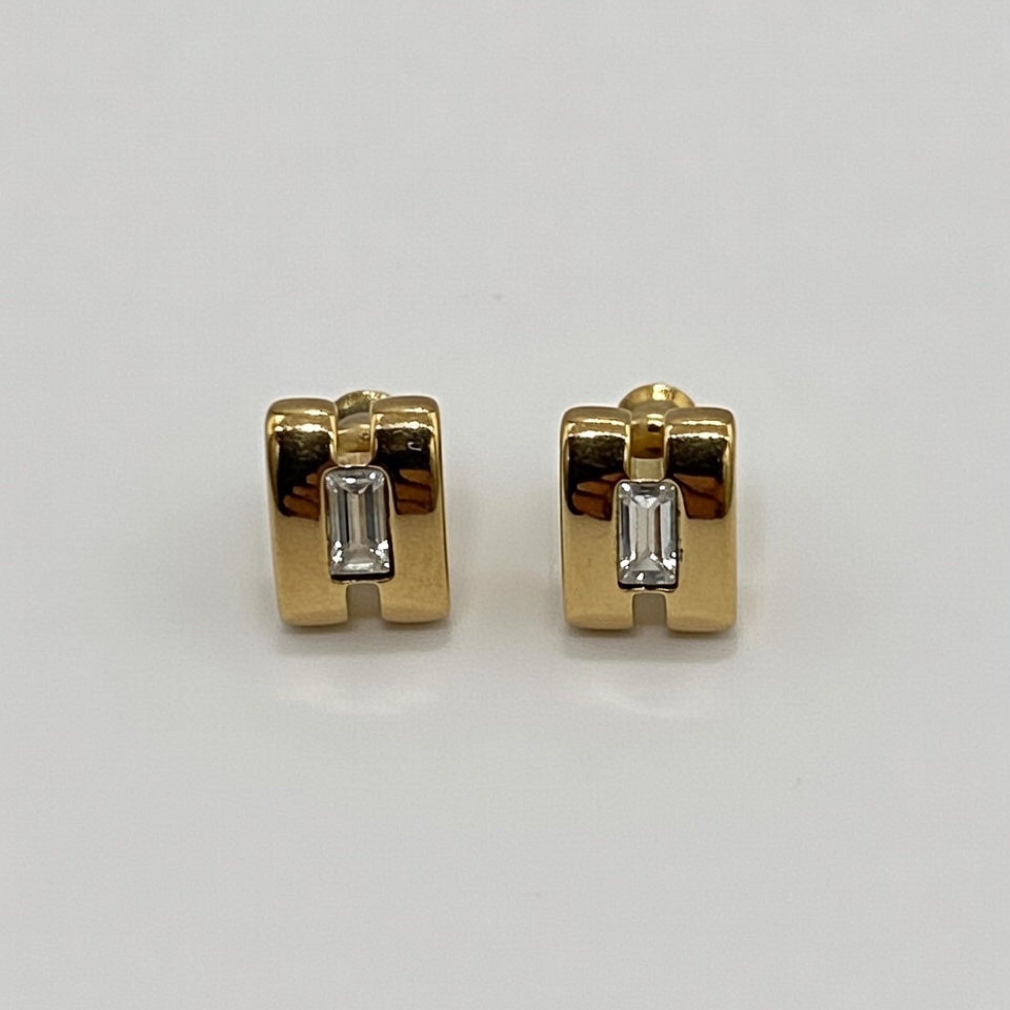 Small h design Gold hoop earrings with baguette cut gemstones 