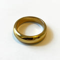 Gold ring on a white background 