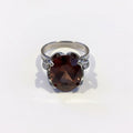 Silver ring with a large brown pink gemstone boheme london