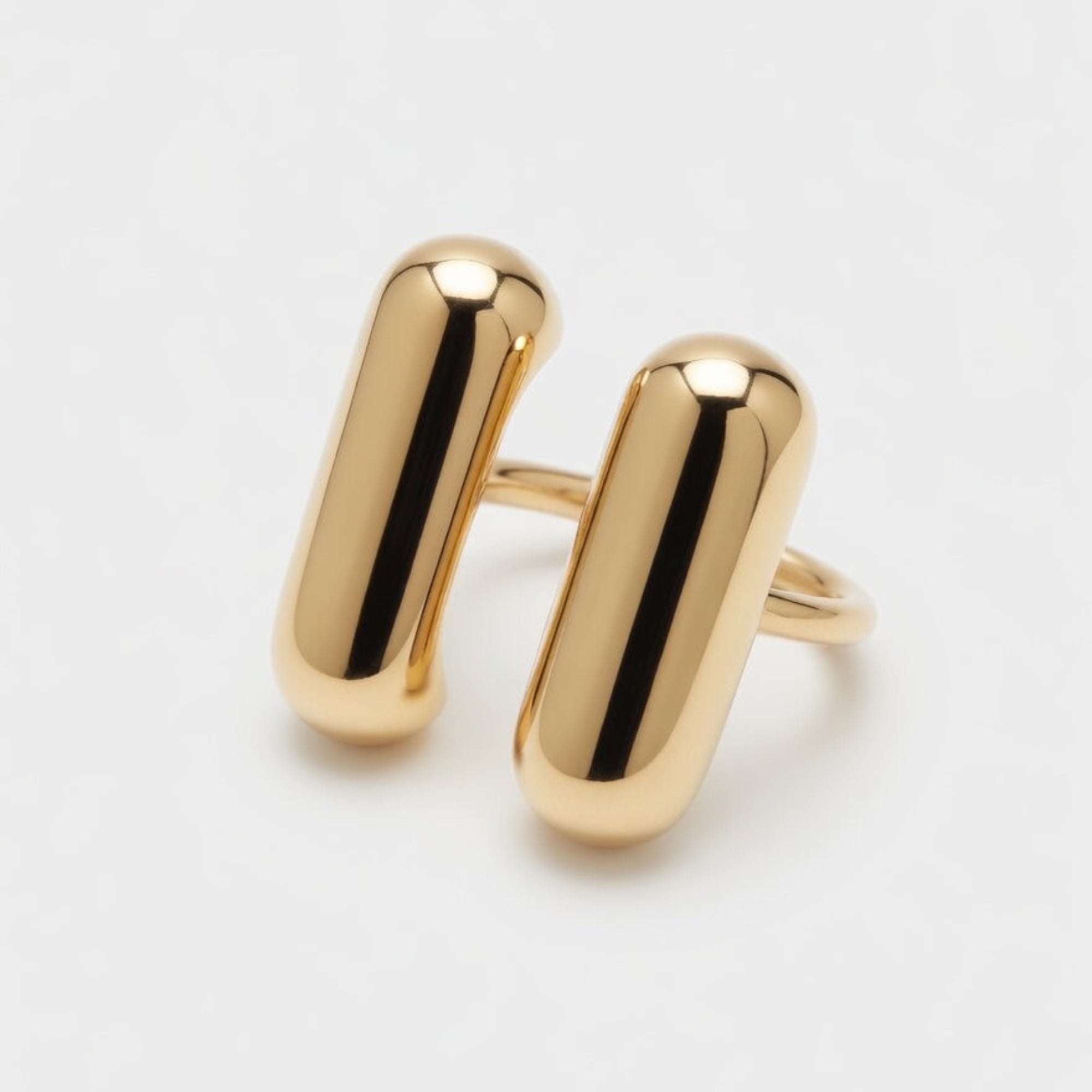 statement gold ring with a deisgner h shape boheme london