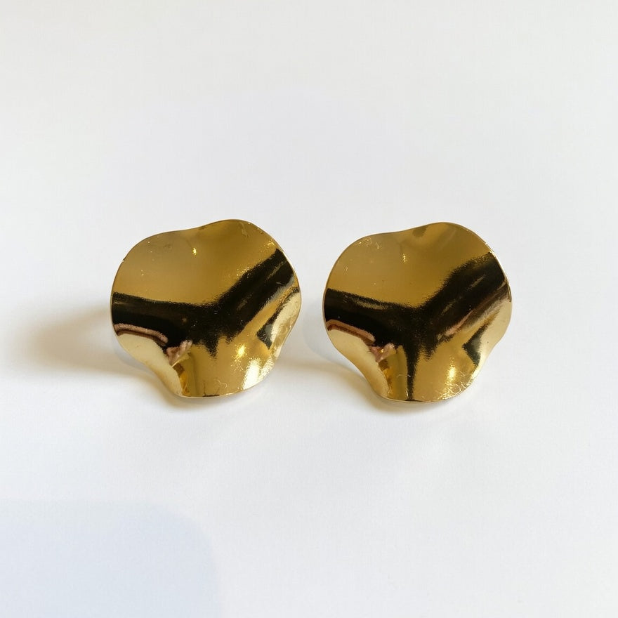 a pair of large petal stud earrings boheme london