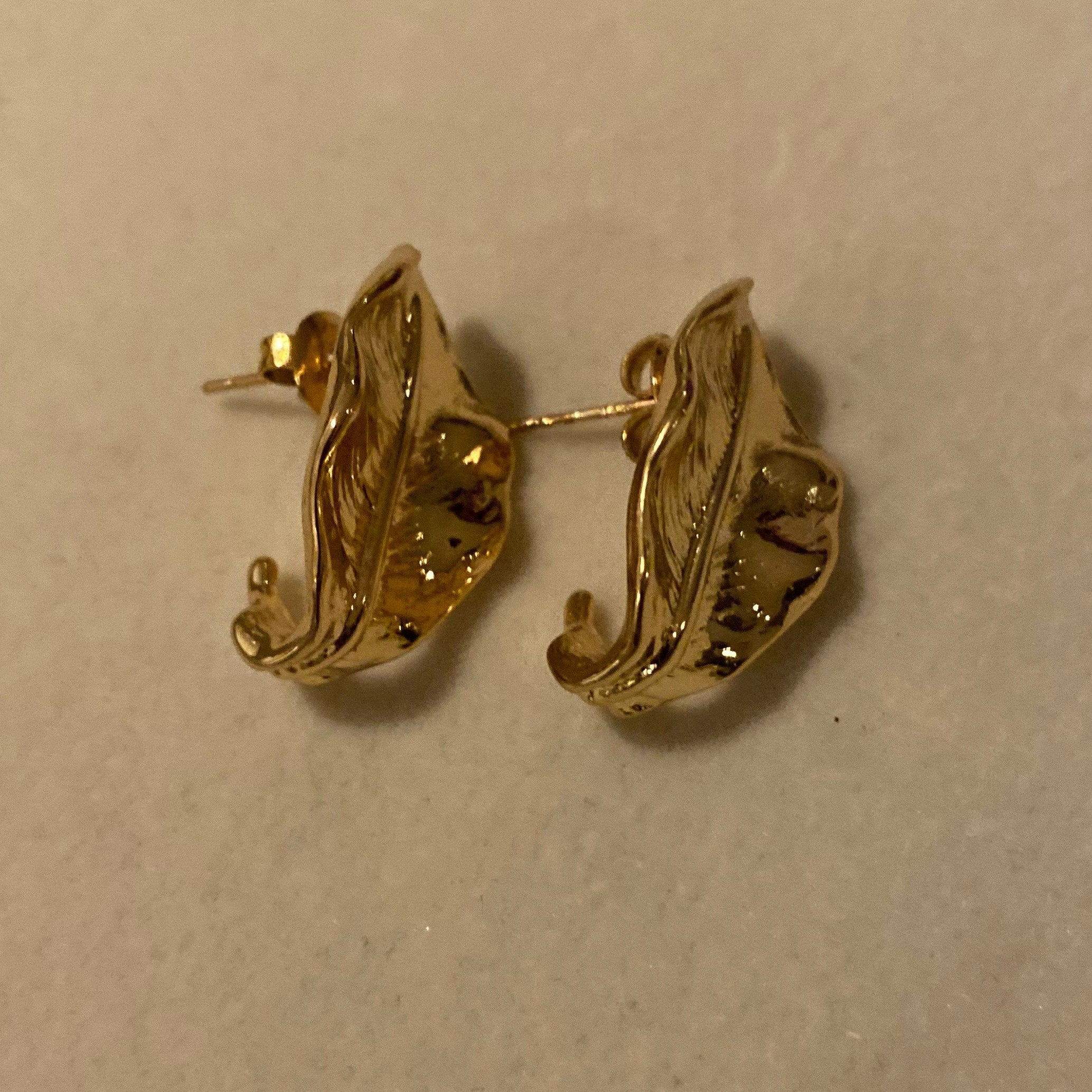 Gold plated sustainable leaf earrings gold leaf studs