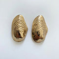 gold shell earrings for a statement and holiday wear boheme london