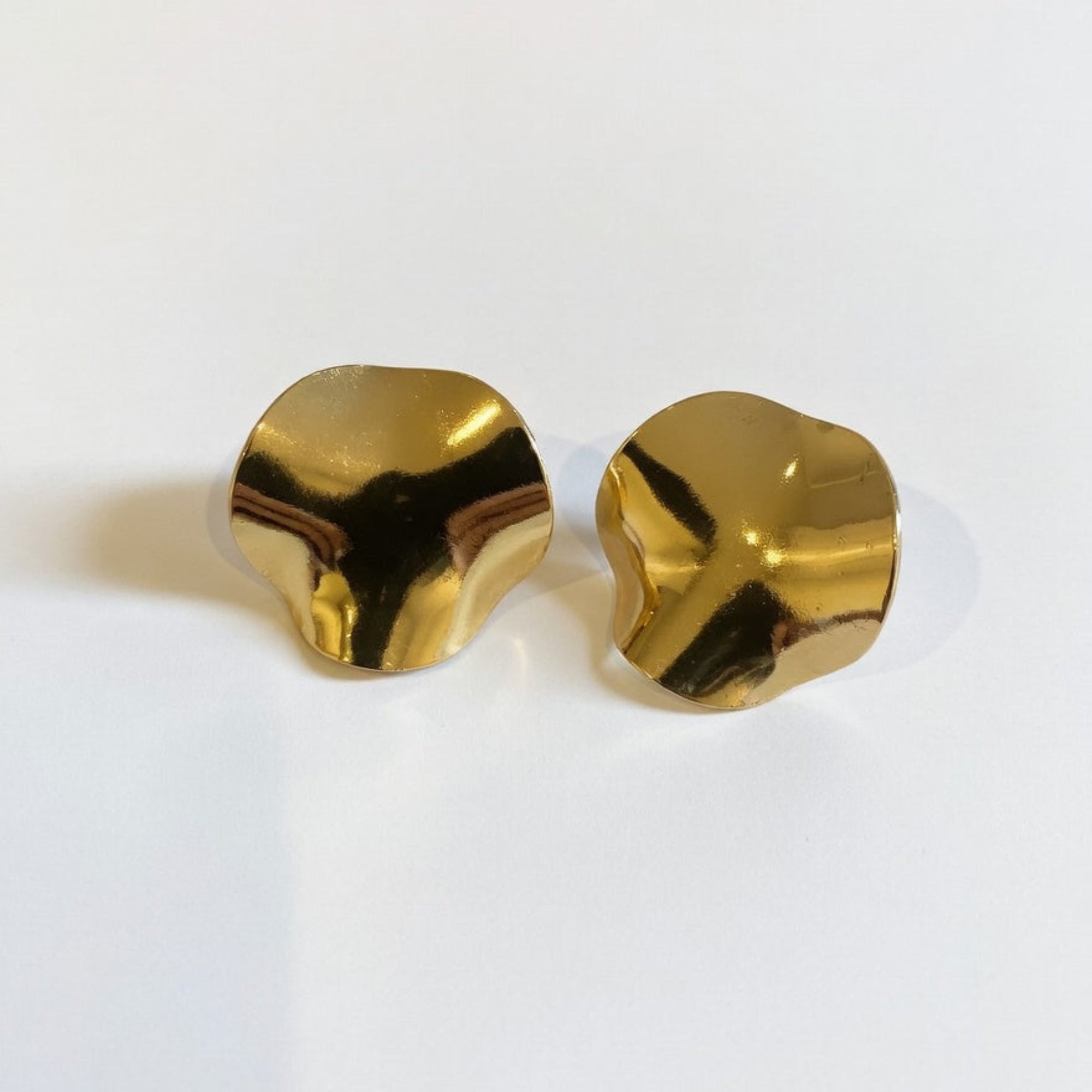 paid of large petal floral stud earrings. gold plated and modern design boheme london